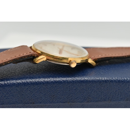 104 - A 'GARRARD' WRISTWATCH, hand wound movement, round dial signed 'Garrard', baton markers, gold plated... 