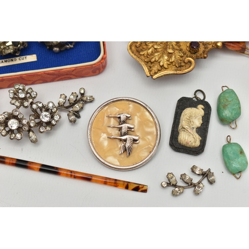 108 - A SMALL ASSORTMENT OF JEWELLERY, to include an early 20th century coral clip, a mid century white me... 