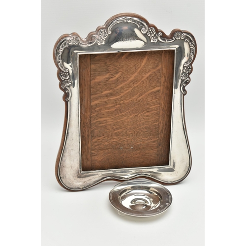 112 - A SILVER PHOTO FRAME AND PIN DISH, an AF silver fronted photo frame with monogram engraving, hallmar... 