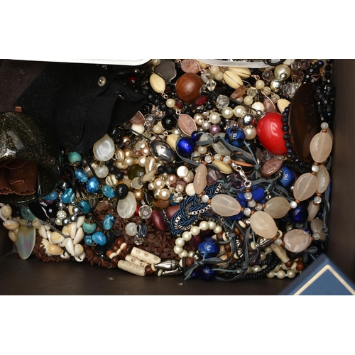 120 - A BOX OF ASSORTED COSTUME JEWELLERY, to include beaded necklaces, clip on earrings, bangles, chain n... 