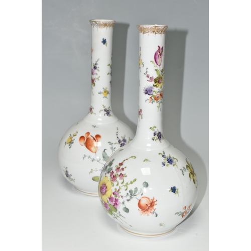 303 - A PAIR OF PFVA DRESDEN STYLE ONION SHAPED VASES HAND PAINTED WITH DEUTCHE BLUMEN, gilt rims, painted... 