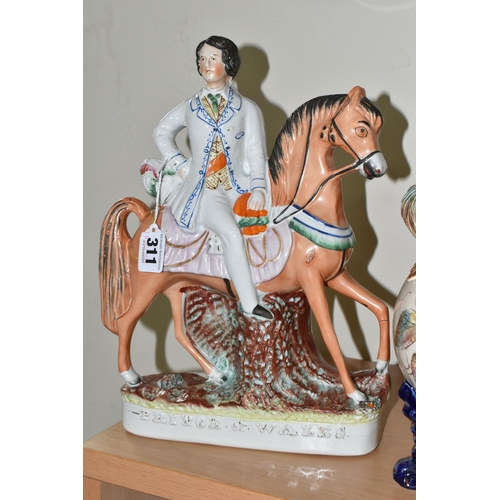 311 - A PAIR OF VICTORIAN STAFFORDSHIRE FIGURES AND A LATE NINETEENTH CENTURY PLANTER, the Staffordshire f... 