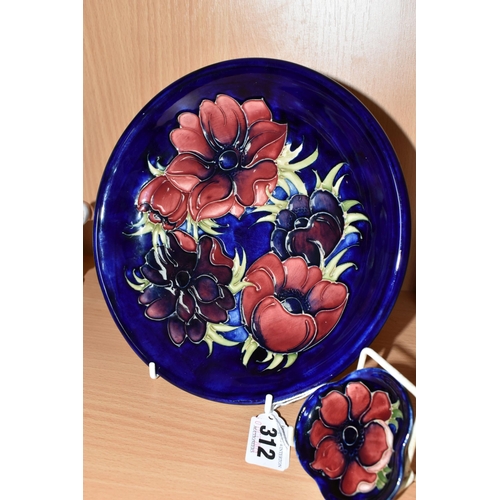 312 - A MOORCROFT POTTERY SHALLOW BOWL AND PIN DISH, both in the Anemone pattern, tube lined with red and ... 