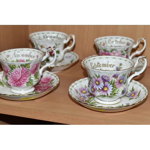 319 - A SET OF ROYAL ALBERT 'FLOWERS OF THE MONTH' TEA CUPS AND SAUCERS, twelve cups and saucers represent... 