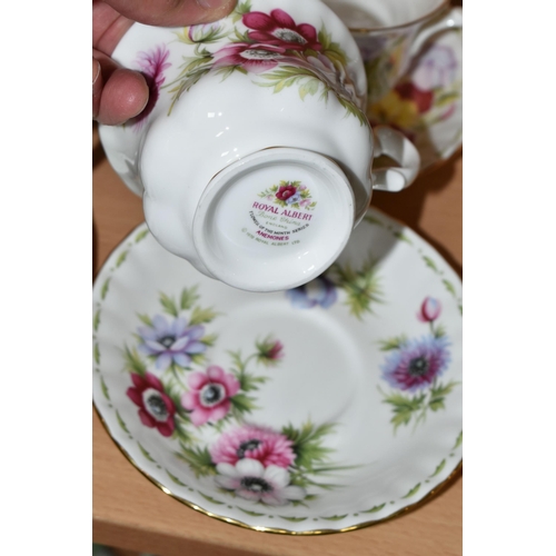 319 - A SET OF ROYAL ALBERT 'FLOWERS OF THE MONTH' TEA CUPS AND SAUCERS, twelve cups and saucers represent... 