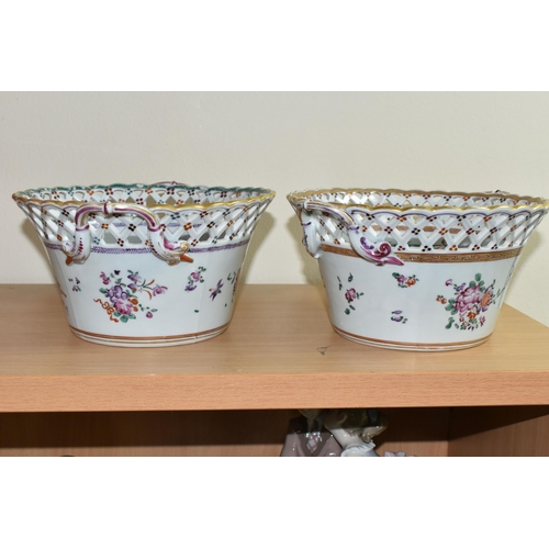 323 - TWO LATE 19TH / EARLY 20TH CENTURY CONTINENTAL PORCELAIN TWIN HANDLED CIRCULAR POLYCHROME CACHE POTS... 