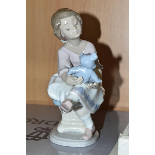 325 - TWO BOXED LLADRO COLLECTORS SOCIETY FIGURES, comprising no.7635 'Ten and Growing', signed and dated ... 