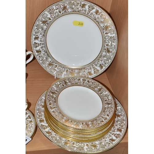 330 - A SMALL QUANTITY OF WEDGWOOD 'GOLD FLORENTINE' W4219 AND 'GOLD DAMASK' PATTERN PART DINNER WARES, th... 