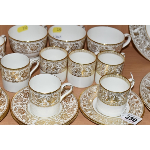 330 - A SMALL QUANTITY OF WEDGWOOD 'GOLD FLORENTINE' W4219 AND 'GOLD DAMASK' PATTERN PART DINNER WARES, th... 