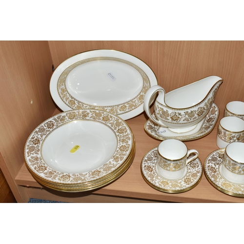 330 - A SMALL QUANTITY OF WEDGWOOD 'GOLD FLORENTINE' W4219 AND 'GOLD DAMASK' PATTERN PART DINNER WARES, th... 