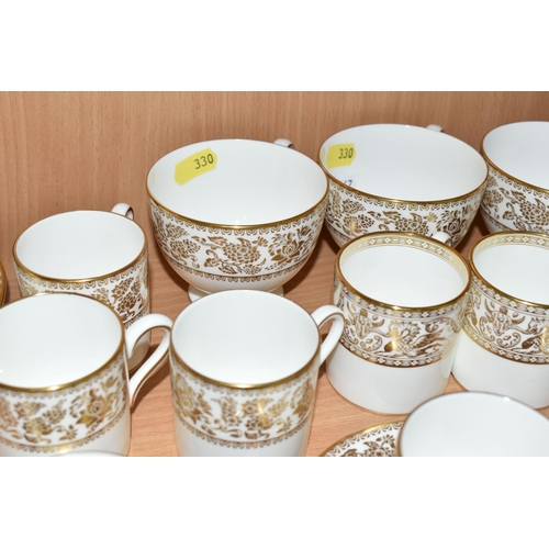 330 - A SMALL QUANTITY OF WEDGWOOD 'GOLD FLORENTINE' W4219 AND 'GOLD DAMASK' PATTERN PART DINNER WARES, th... 