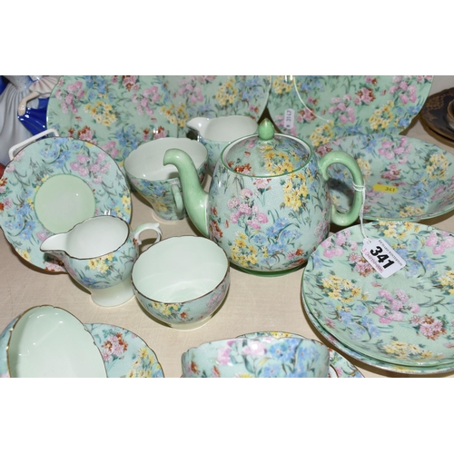 341 - EIGHTEEN PIECES OF SHELLEY 'MELODY' CHINTZ PATTERN TEA WARES, comprising a small tea pot, small milk... 