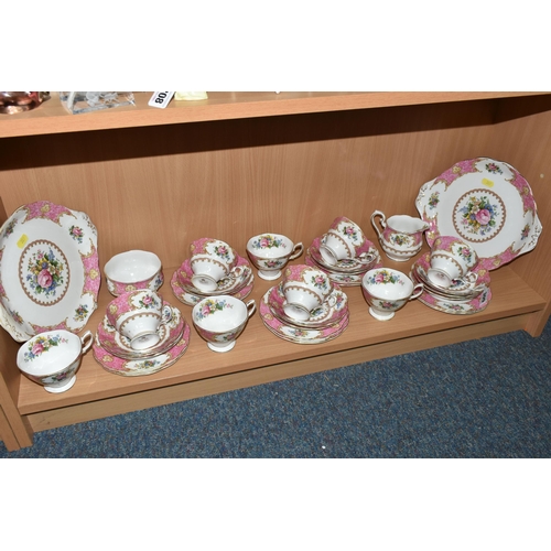 309 - A THIRTY FOUR PIECE ROYAL ALBERT 'LADY CARLYLE' TEA SET, comprising  two cake plates, a cream jug, a... 