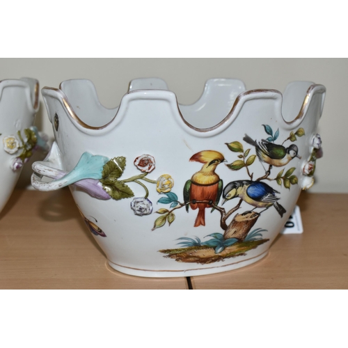 310 - A PAIR OF LATE 19TH / EARLY 20TH CENTURY CONTINENTAL PORCELAIN TWIN HANDLED CACHE-POT PLANTERS, the ... 