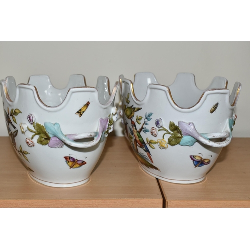 310 - A PAIR OF LATE 19TH / EARLY 20TH CENTURY CONTINENTAL PORCELAIN TWIN HANDLED CACHE-POT PLANTERS, the ... 