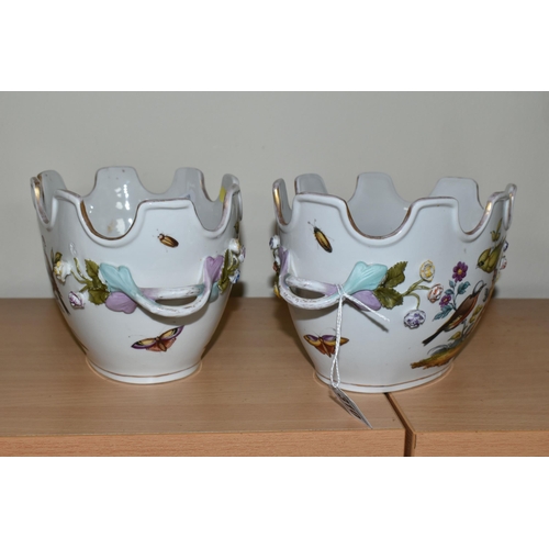 310 - A PAIR OF LATE 19TH / EARLY 20TH CENTURY CONTINENTAL PORCELAIN TWIN HANDLED CACHE-POT PLANTERS, the ... 