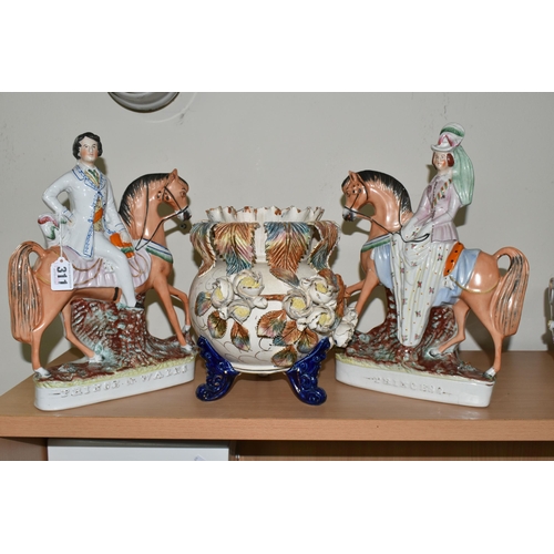 311 - A PAIR OF VICTORIAN STAFFORDSHIRE FIGURES AND A LATE NINETEENTH CENTURY PLANTER, the Staffordshire f... 