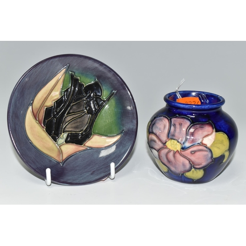 315 - TWO PIECES OF MOORCROFT POTTERY, comprising a pin dish in 'Black Tulip' pattern on a grey-purple and... 