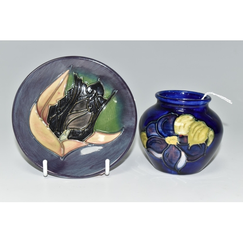 315 - TWO PIECES OF MOORCROFT POTTERY, comprising a pin dish in 'Black Tulip' pattern on a grey-purple and... 