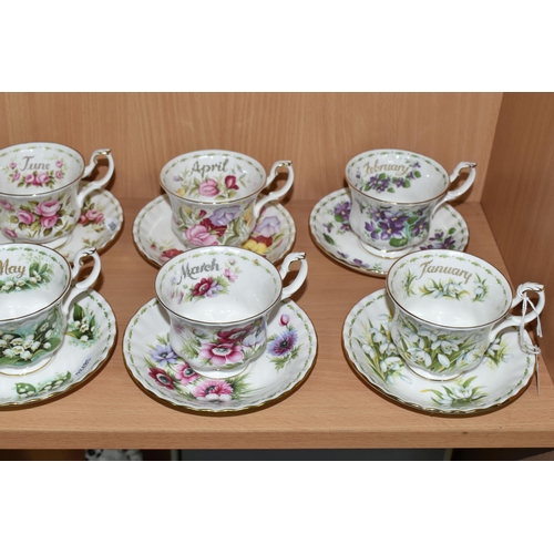 319 - A SET OF ROYAL ALBERT 'FLOWERS OF THE MONTH' TEA CUPS AND SAUCERS, twelve cups and saucers represent... 