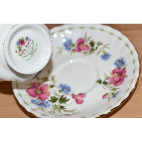 319 - A SET OF ROYAL ALBERT 'FLOWERS OF THE MONTH' TEA CUPS AND SAUCERS, twelve cups and saucers represent... 