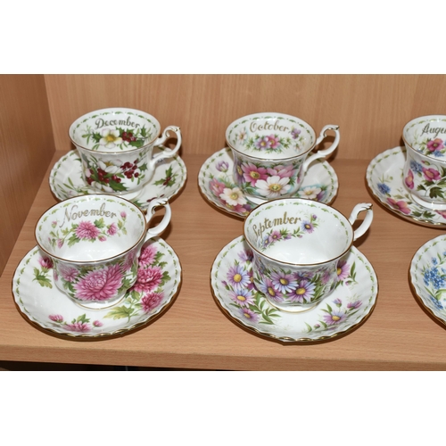 319 - A SET OF ROYAL ALBERT 'FLOWERS OF THE MONTH' TEA CUPS AND SAUCERS, twelve cups and saucers represent... 