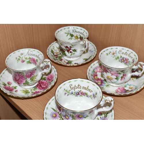 319 - A SET OF ROYAL ALBERT 'FLOWERS OF THE MONTH' TEA CUPS AND SAUCERS, twelve cups and saucers represent... 