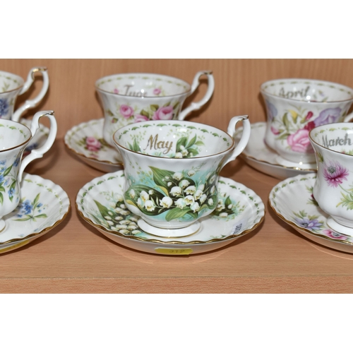 319 - A SET OF ROYAL ALBERT 'FLOWERS OF THE MONTH' TEA CUPS AND SAUCERS, twelve cups and saucers represent... 