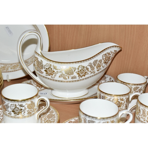 330 - A SMALL QUANTITY OF WEDGWOOD 'GOLD FLORENTINE' W4219 AND 'GOLD DAMASK' PATTERN PART DINNER WARES, th... 