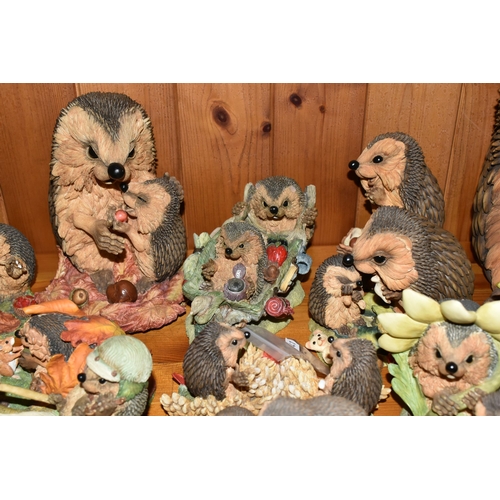 332 - A COLLECTION OF 'HEDGIES' HEDGEHOG RESIN FIGURES, in varying sizes, the largest 'Edward', height 25c... 