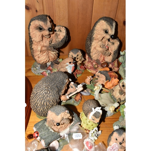 332 - A COLLECTION OF 'HEDGIES' HEDGEHOG RESIN FIGURES, in varying sizes, the largest 'Edward', height 25c... 