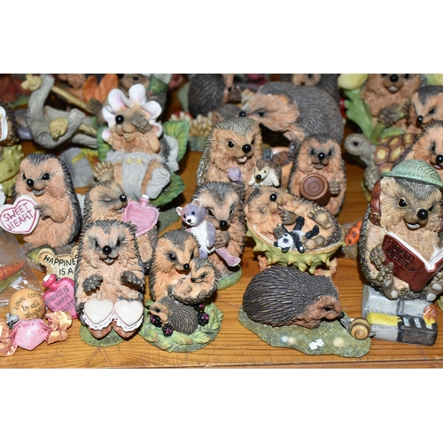 332 - A COLLECTION OF 'HEDGIES' HEDGEHOG RESIN FIGURES, in varying sizes, the largest 'Edward', height 25c... 