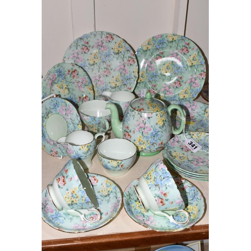 341 - EIGHTEEN PIECES OF SHELLEY 'MELODY' CHINTZ PATTERN TEA WARES, comprising a small tea pot, small milk... 