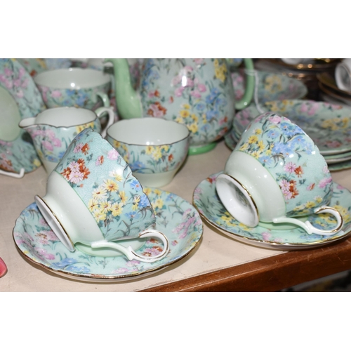 341 - EIGHTEEN PIECES OF SHELLEY 'MELODY' CHINTZ PATTERN TEA WARES, comprising a small tea pot, small milk... 