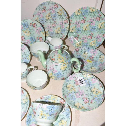 341 - EIGHTEEN PIECES OF SHELLEY 'MELODY' CHINTZ PATTERN TEA WARES, comprising a small tea pot, small milk... 