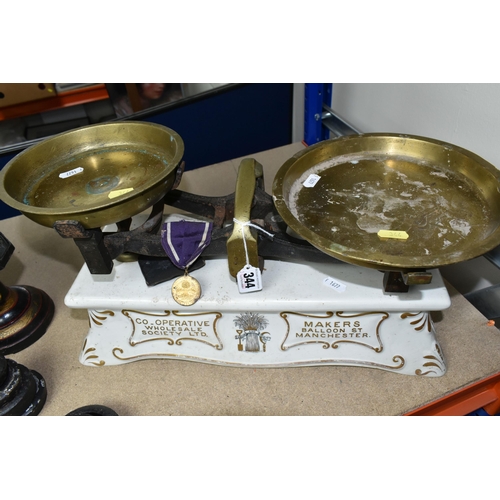 344 - A SET OF VICTORIAN CO-OPERATIVE WHOLESALE SOCIETY CREAMWARE SCALES, A CWS MEDAL, OTHER SCALES AND WE... 