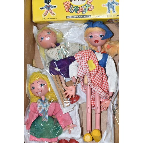 367 - A BOX OF PELHAM PUPPETS, seven puppets comprising Cowboy, Dutch Girl, Wolf, Pinocchio, Bengo and two... 