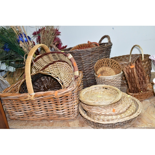 374 - A COLLECTION OF WICKER BASKETS, approximately twenty pieces, different shapes, styles and sizes, lar... 