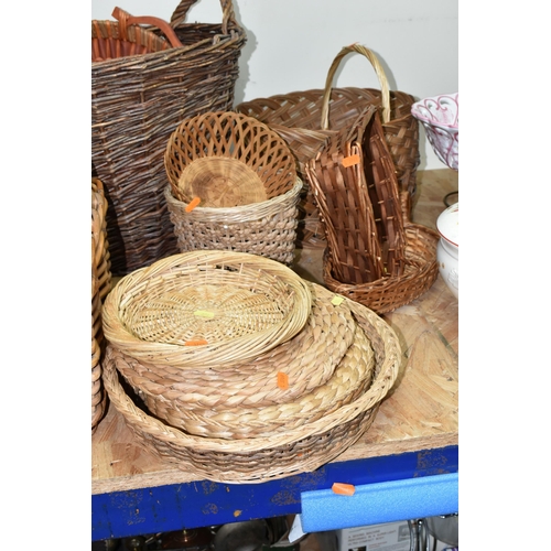 374 - A COLLECTION OF WICKER BASKETS, approximately twenty pieces, different shapes, styles and sizes, lar... 