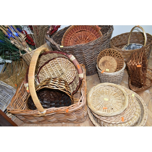 374 - A COLLECTION OF WICKER BASKETS, approximately twenty pieces, different shapes, styles and sizes, lar... 