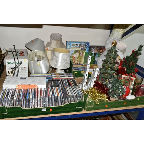 375 - THREE BOXES AND LOOSE TABLE LAMPS, SEWING MACHINE, CDS, DVDS, CHRISTMAS DECORATIONS AND SUNDRY ITEMS... 