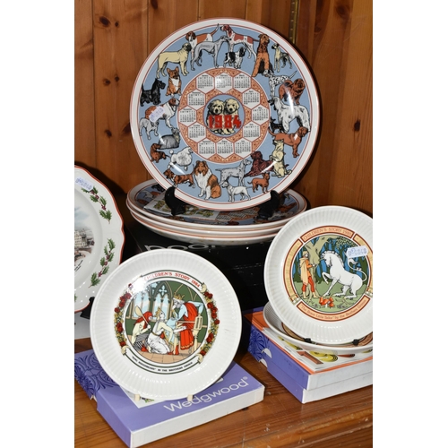 382 - A COLLECTION OF WEDGWOOD COLLECTORS PLATES, comprising twenty four mostly boxed plates: four Childre... 