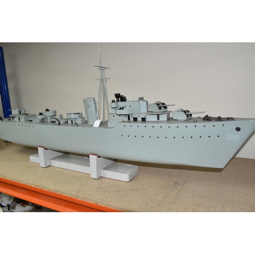 383 - A MOTORISED MODEL DESTROYER, the scratch built ship with brass hull, covered motor compartment and s... 