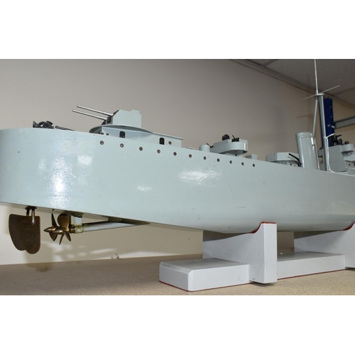 383 - A MOTORISED MODEL DESTROYER, the scratch built ship with brass hull, covered motor compartment and s... 