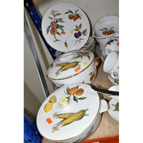 393 - ROYAL WORCESTER 'EVESHAM' PART DINNER SERVICE, comprising seven cups, six saucers, six side plates, ... 