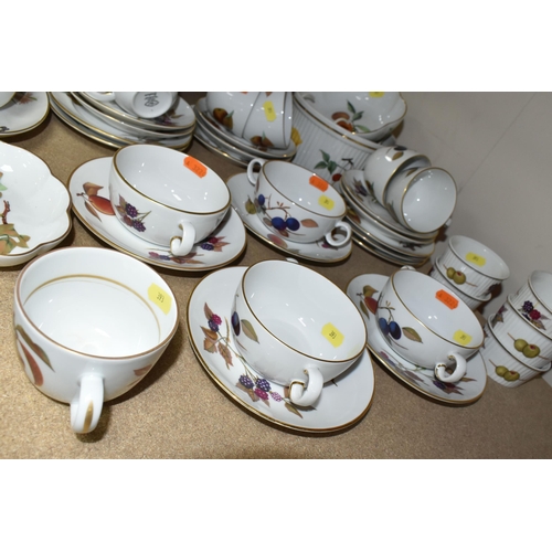 393 - ROYAL WORCESTER 'EVESHAM' PART DINNER SERVICE, comprising seven cups, six saucers, six side plates, ... 