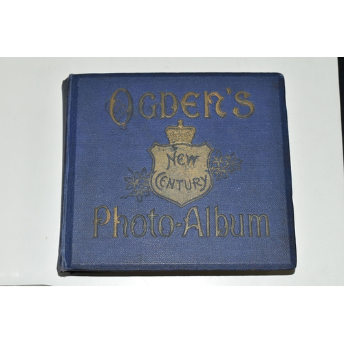 401 - AN OGDEN'S NEW CENTURY PHOTOGRAPH ALBUM containing 199 Ogden's Guinea Gold Cigarette Cards featuring... 