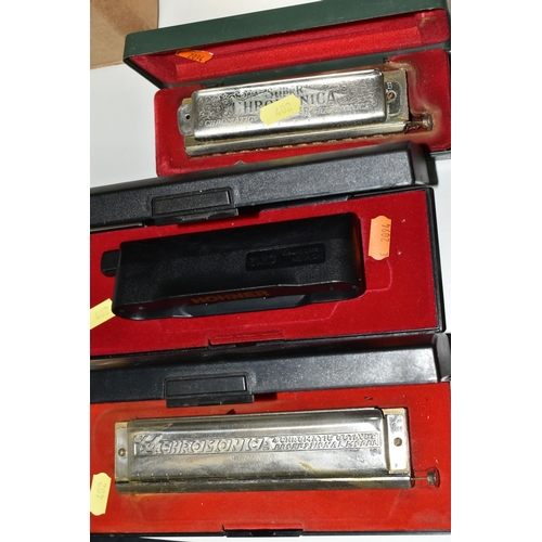 402 - A GROUP OF TEN CASED HOHNER HARMONICAS, comprising The 64 Chromonica professional model, a CX12, a C... 