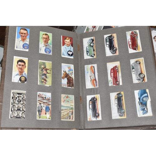 403 - TWO CIGARETTE CARD ALBUMS AND A BOX OF CIGARETTE CARDS containing a miscellaneous collection of sets... 