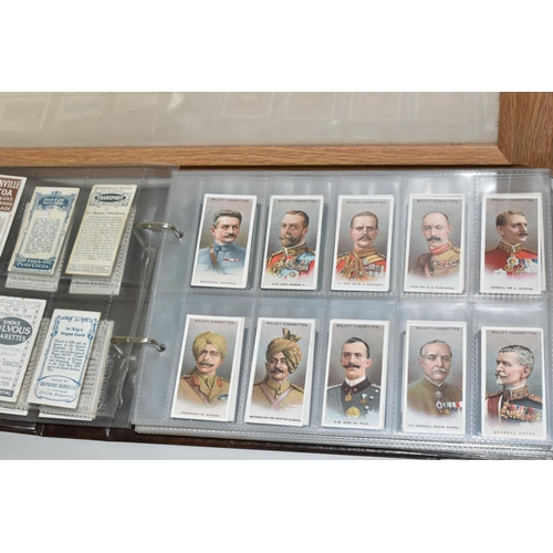 403 - TWO CIGARETTE CARD ALBUMS AND A BOX OF CIGARETTE CARDS containing a miscellaneous collection of sets... 